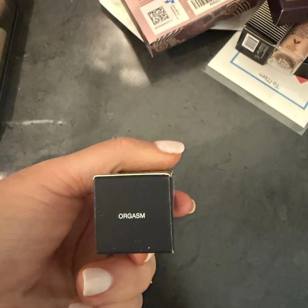 NARS Lip Balm in Shade Orgasm pink tone